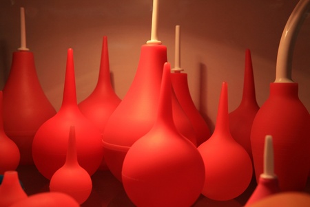 Collection of red medical enemas of the different sizesの写真素材