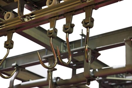 Hooks for meat in finishing shop of meat-packing plant の写真素材