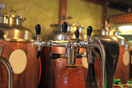 Private brewery bottles beer into bottles clientsの写真素材