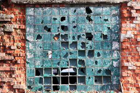 Broken windows of old industrial building  Background の写真素材
