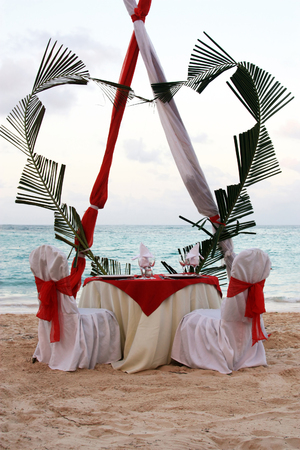 Table setting on the ocean for a romantic dinnerの写真素材