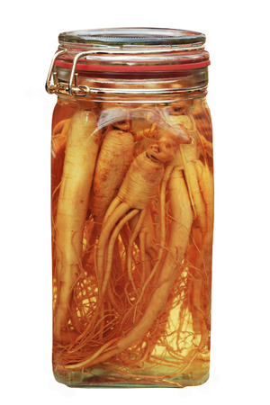 Extract of ginseng root in the glass jarの写真素材