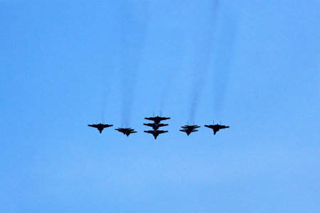 Nine different military aircraft types flying in formationの写真素材