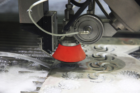 Metalworking. Machine for water jet cutting with abrasiveの写真素材