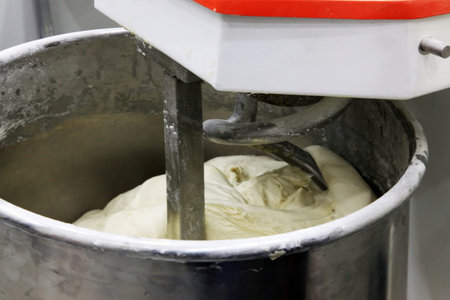 kneading dough for bread with a food processorの写真素材