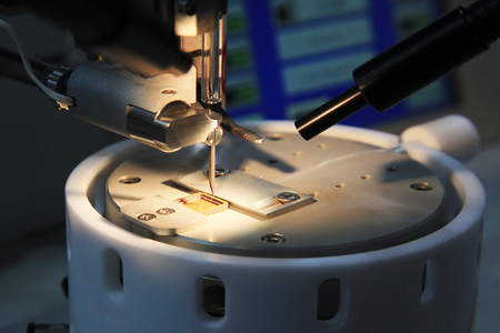 soldering of the gold conductors in the housing of the microprocessorの写真素材