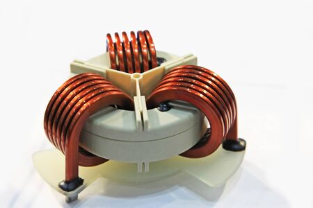Transformer copper coil isolated on a white backgroundの写真素材