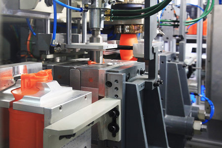 formation of plastic cans in the mold