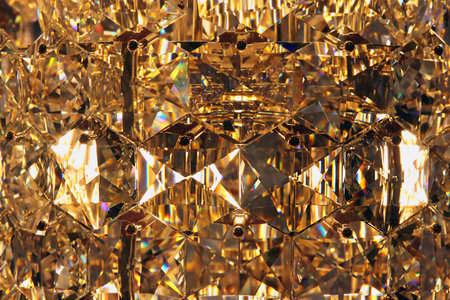 Lots of large colorful crystals. Wisps of light in the chandelier. Beautiful decorの写真素材