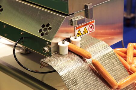 food production of sausage at a meat-packing plantの写真素材