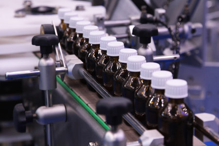 Medical vials on pharmaceutical manufacturing line.  Process of production