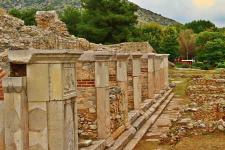 Columns and elements of the ancient Greek architecture in the ruins of the old town of Philippi, Greeceの写真素材