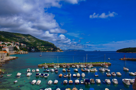 A view from the old town of Dubrovnik towards the mountains, the Mediterranean sea and the city, Dubrovnik, Croatiaの写真素材