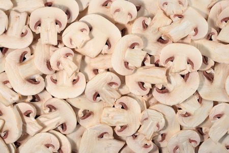 Sliced mushrooms as background textureの写真素材