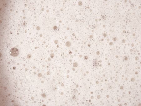 Beer foam texture close up as background.の写真素材