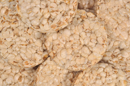 Puffed rice snack close up as background
