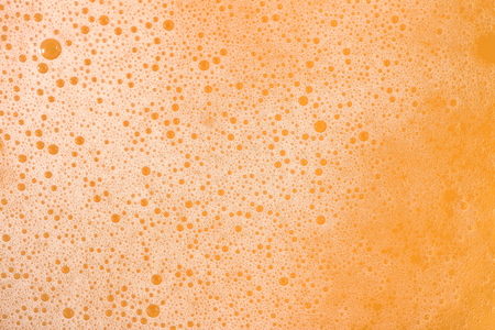 Beer foam texture close up as background.の写真素材
