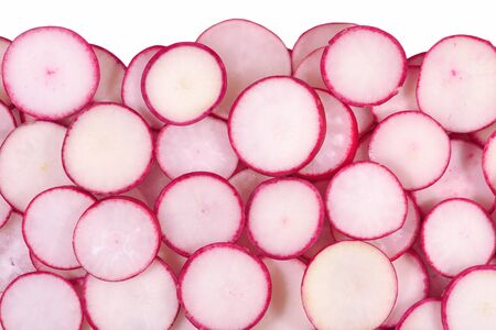 Red sliced radish on a white backgroundの写真素材