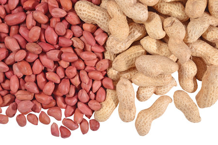 Heap of peanuts on a white background