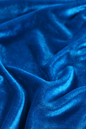 Blue wrinkled velvet as abstract backgroundの写真素材