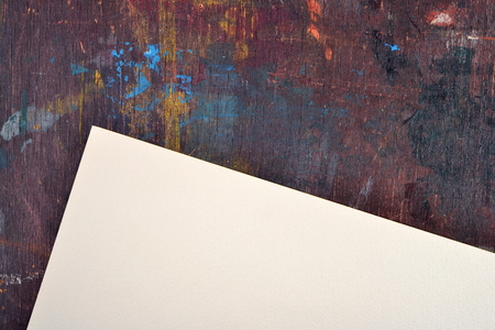 Sheet of watercolor paper on old wooden easelの写真素材