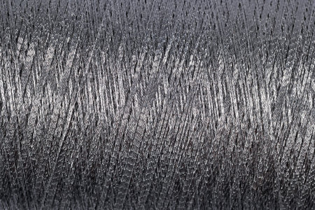 Spool of thread macro background texture