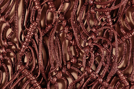 Macrame leather belts  close up as backgroundの写真素材