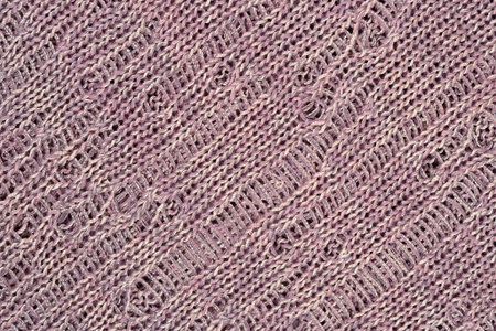 Pinkgray openwork melange stockinet as background texture