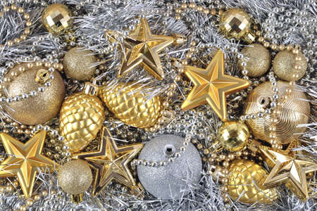 Golden and silver Christmas decorations for backgroundの写真素材