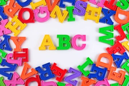 Plastic colored alphabet letters ABC on a white backgroundの写真素材