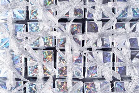 Top view of silver gifts as backgroundの写真素材