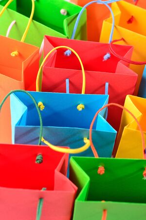 Shopping colorful sale paper bags close-up as backgroundの写真素材