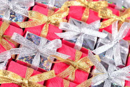 Top view of colorful gifts close-up as background