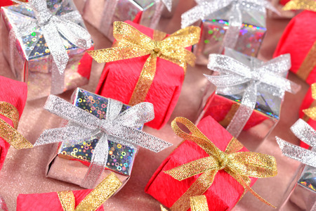 Top view of colorful gifts close-up as backgroundの写真素材