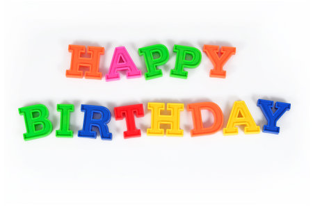 Happy birthday colorful text on a white backgroundの写真素材