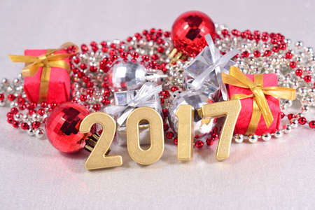 2017 year golden figures on the background of Christmas decorationsの写真素材