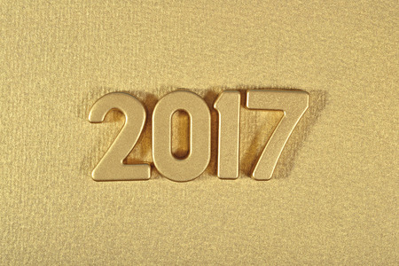 2017 year golden figures on a golden backgroundの写真素材