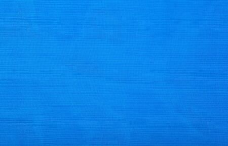 Blue transparent caprone cloth as background texture close up の写真素材