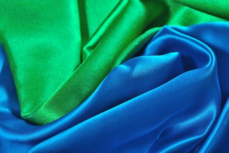 Natural blue and green satin fabric as background textureの写真素材