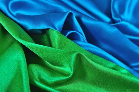 Natural blue and green satin fabric as background textureの写真素材
