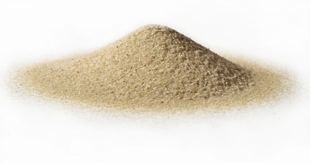 Heap of beach sand on white backgroundの写真素材