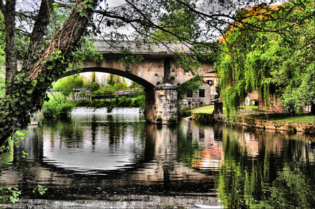 Bridge on the river in Allariz Spainの写真素材