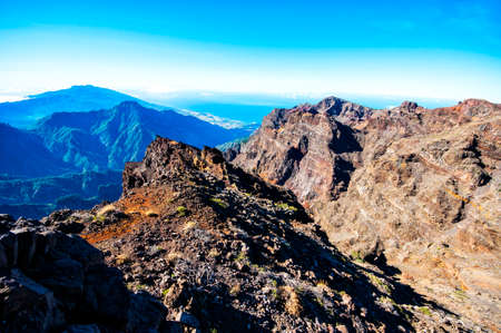 Picturesque scene of rocky mountains, clear sky and sea in sunlight.の写真素材