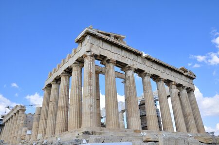 Ruins of the Acropolis of Athens in Greece on a cloudy dayの写真素材