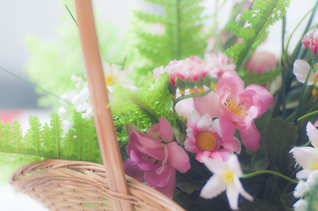 Pink plastic flower bokeh on white backgroundの写真素材