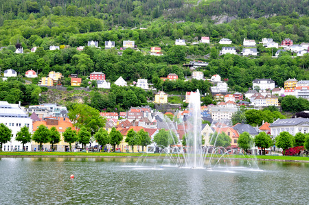 Housings between the trees in bergen Norwegianの写真素材