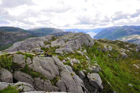 LYSEFJORD-NORWAY, 05JUNE-2017    tourists in preikestolen or pulpit in Norway on a day with cloudsclimb to the prektestolen or pulpit in Norwayclimb to the prektestolen or pulpit in Norwayのeditorial素材