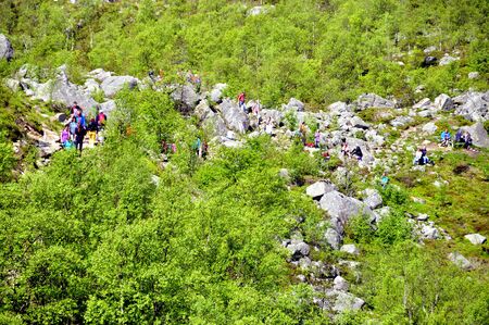 LYSEFJORD-NORWAY, 05JUNE-2017    tourists in preikestolen or pulpit in Norway on a day with cloudsclimb to the prektestolen or pulpit in Norwayclimb to the prektestolen or pulpit in Norwayのeditorial素材