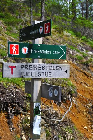 LYSEFJORD-NORWAY, 05JUNE-2017    tourists in preikestolen or pulpit in Norway on a day with cloudsclimb to the prektestolen or pulpit in Norwayclimb to the prektestolen or pulpit in Norwayのeditorial素材