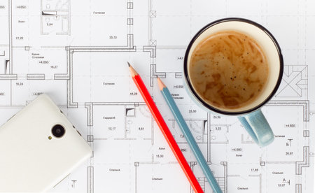 smartphone pencils a Cup of coffee on the project